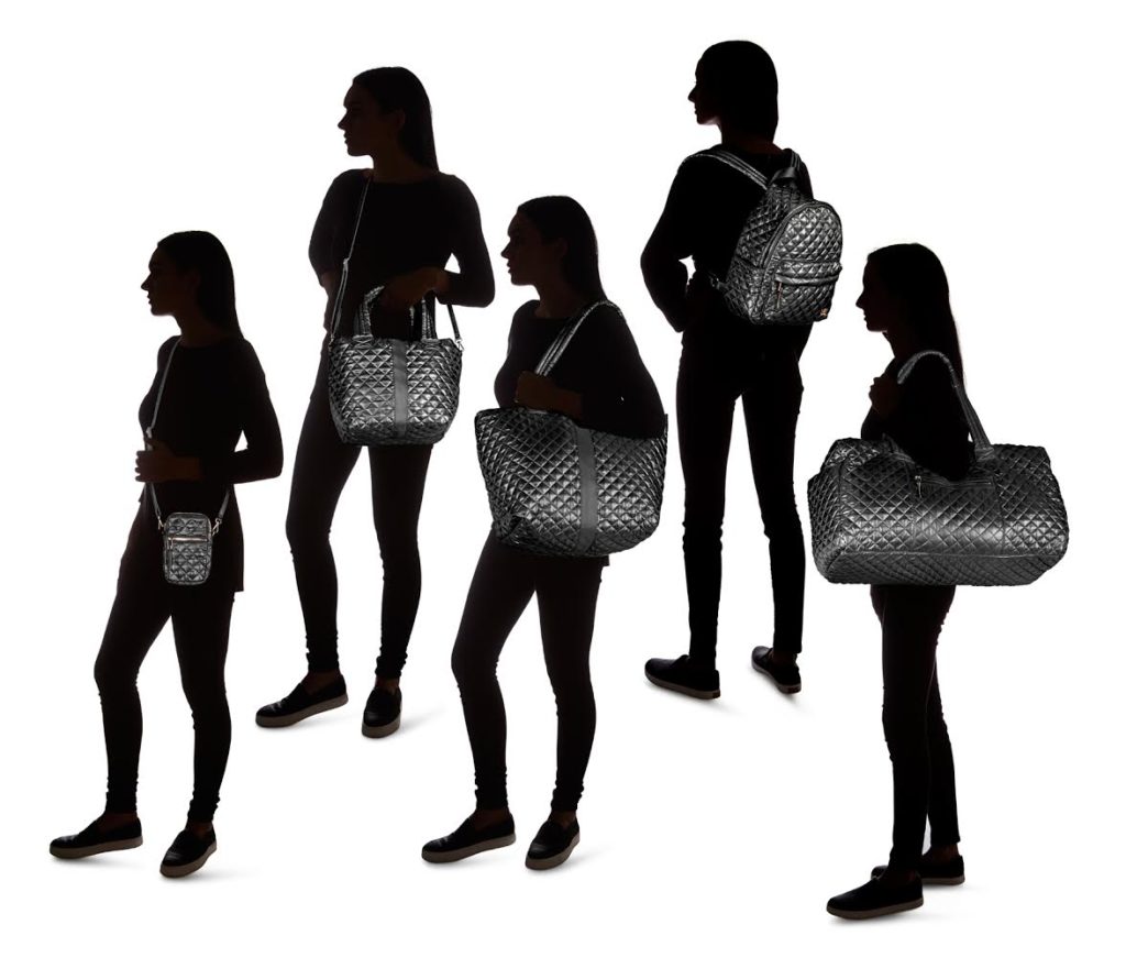 Silhouettes of woman with bags